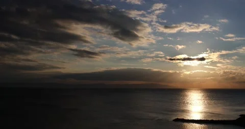 Wide-angle sunset time-lapse on the sea with a horizon line, cloudscape sky Stock Footage 200107563