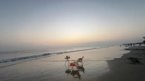 Wide Angle Sunset Time-lapse of Coastal Camping and Beach Life Stock Footage 329341540