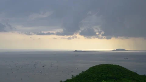 Wide angle sunset view over ocean bay with boats and tropical island landscape Stock Footage 341940887