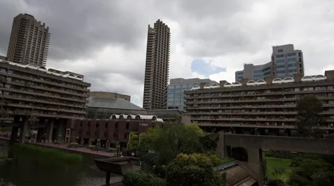 Wide angle time lapse of Barbican Centre City of London with clouds Video stock 64295816