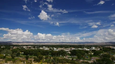 A wide angle time lapse of a beautiful little park in a small mountain town. Stock Footage 54469004