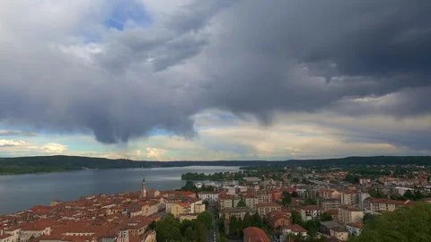 Wide-angle time-lapse of storm clouds over Arona and Lake Maggiore 스톡 동영상 279426971