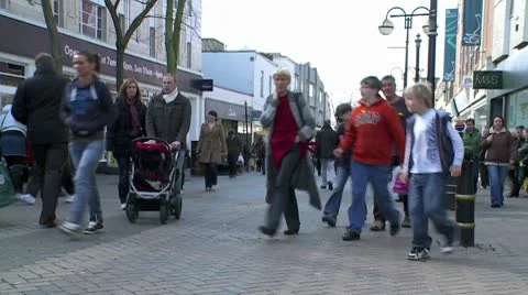 Wide angle timelapse of busy high street Stock Footage 10792712