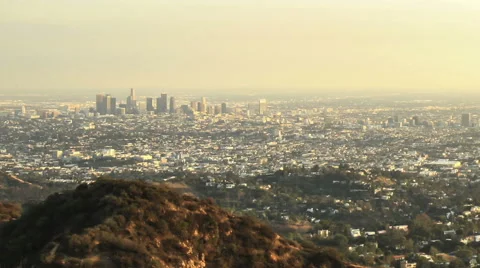 Wide angle timelapse of Los Angeles skyline and Hollywood as the sun goes down Stock Footage 43969861