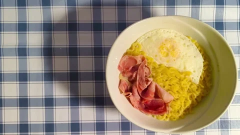 Wide angle top down view of delicious tasty asian ramen noodles cuisine in bowl Video stock 318257914