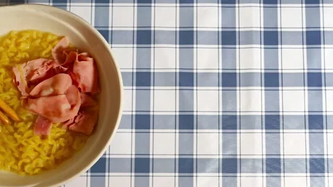 Wide angle top down view of delicious tasty asian ramen noodles cuisine in a whi Stock Footage 318258461