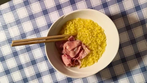Wide angle top down view of delicious tasty asian ramen noodles cuisine in .. 動画素材 318267947