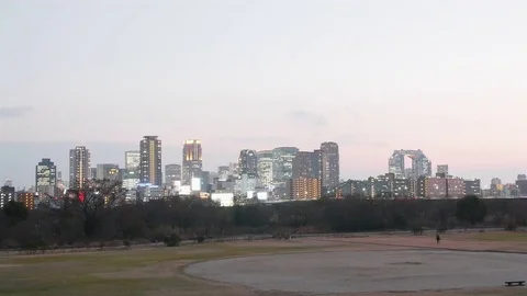 Wide angle Umeda City Skyline Time lapse afternoon city lights  Vídeo Stock 72579396