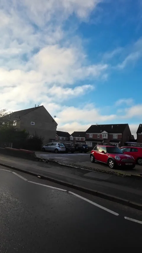 Wide Angle Vertical Footage of British Urban City Streets During Car Drive Stock Footage 327448610