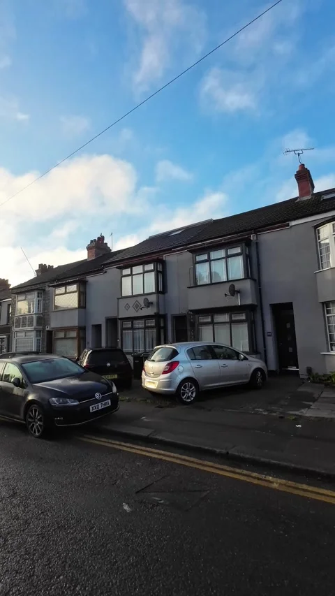 Wide Angle Vertical Footage of British Urban City Streets During Car Drive Stock Footage 327448614