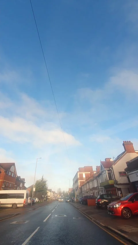 Wide Angle Vertical Footage of British Urban City Streets During Car Drive Vídeos de archivo 327449039