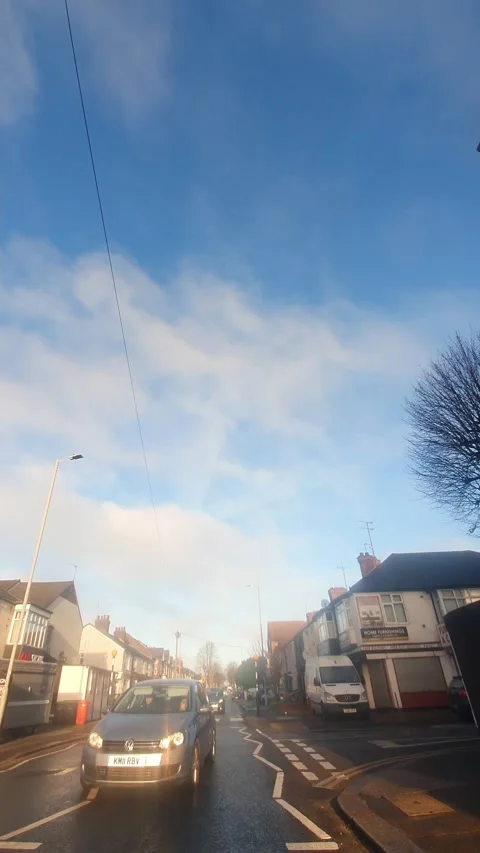 Wide Angle Vertical Footage of British Urban City Streets During Car Drive Vídeos de archivo 327449182