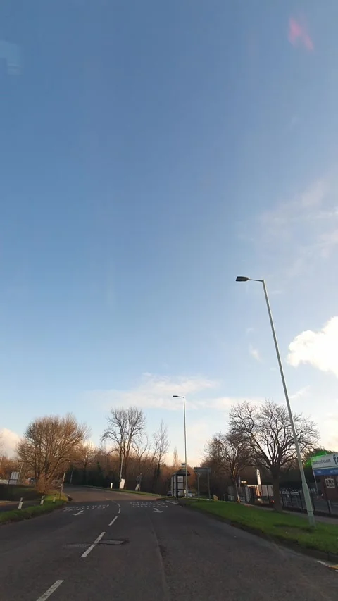 Wide Angle Vertical Footage of British Urban City Streets During Car Drive Vídeo Stock 327449562