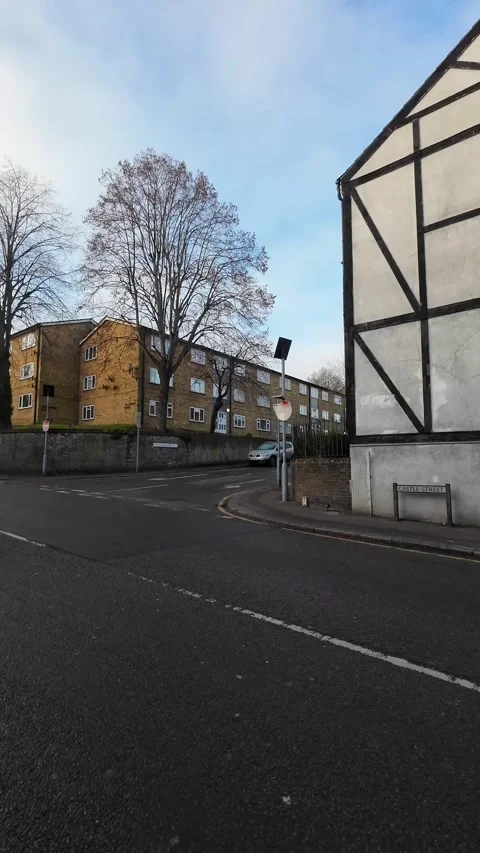 Wide Angle Vertical Footage of British Urban City Streets During Car Drive Vídeo Stock 327450844