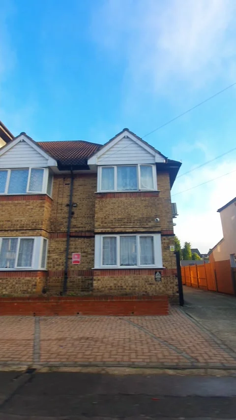 Wide Angle Vertical Footage of British Urban City Streets During Car Drive Stock Footage 327451556