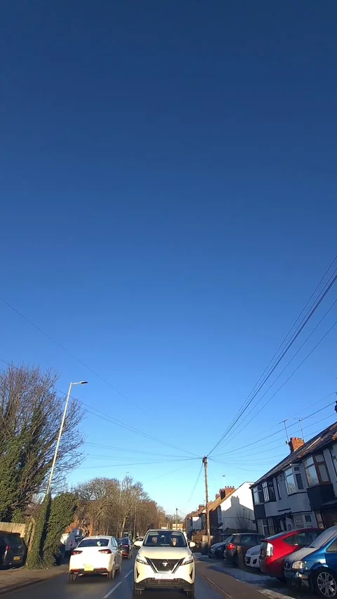 Wide Angle Vertical Footage of British Urban City Streets During Car Drive Vídeo Stock 327451860
