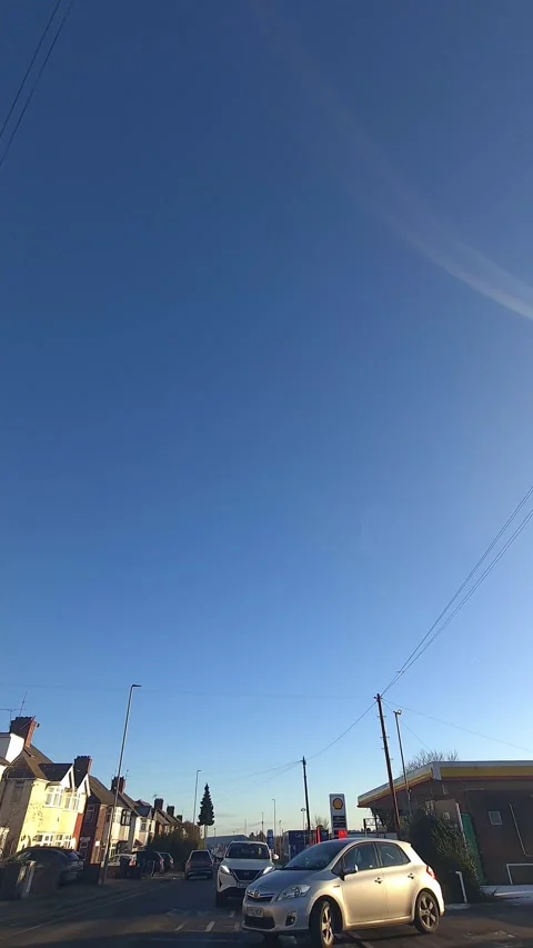 Wide Angle Vertical Footage of British Urban City Streets During Car Drive Vídeos de archivo 327451891