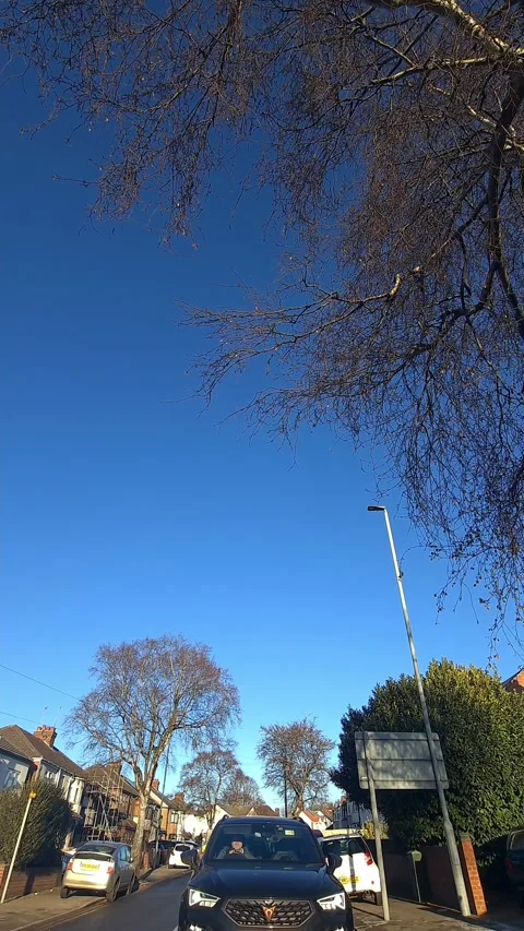 Wide Angle Vertical Footage of British Urban City Streets During Car Drive Stock Footage 327451929
