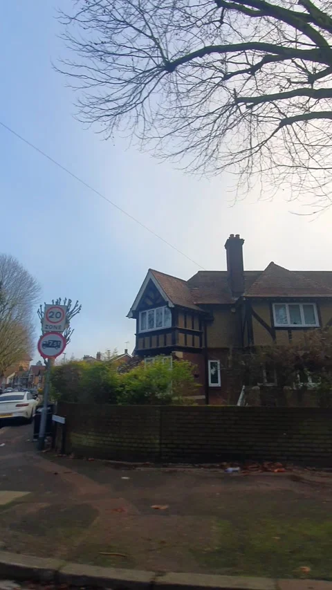 Wide Angle Vertical Footage of British Urban City Streets During Car Drive Vídeo Stock 327451970
