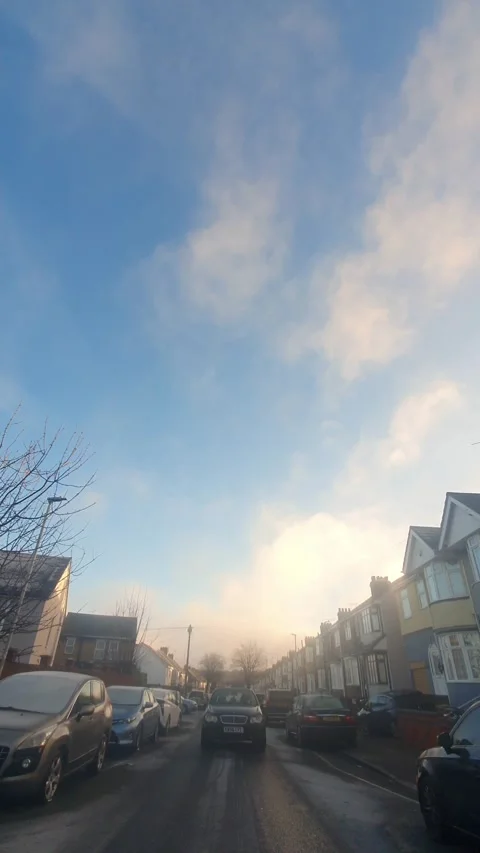Wide Angle Vertical Footage of British Urban City Streets During Car Drive Stock Footage 327451990