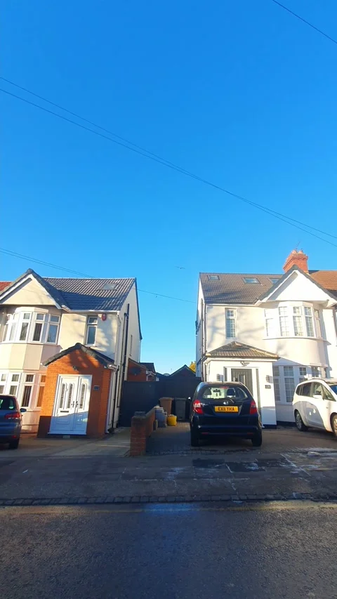Wide Angle Vertical Footage of British Urban City Streets During Car Drive Vídeo Stock 327452147