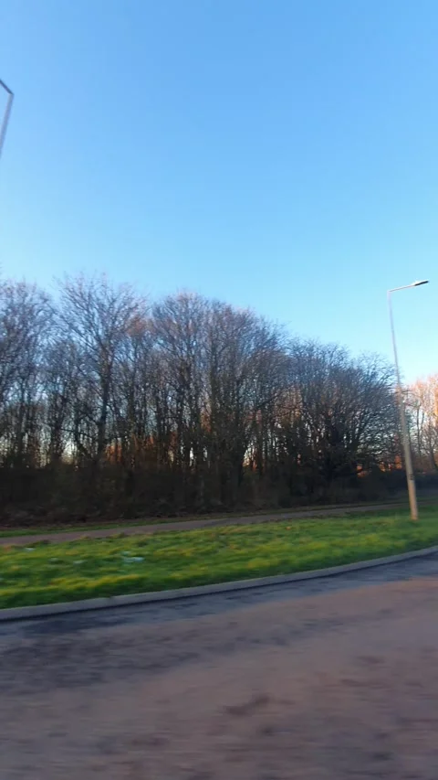 Wide Angle Vertical Footage of British Urban City Streets During Car Drive Vídeo Stock 327452160
