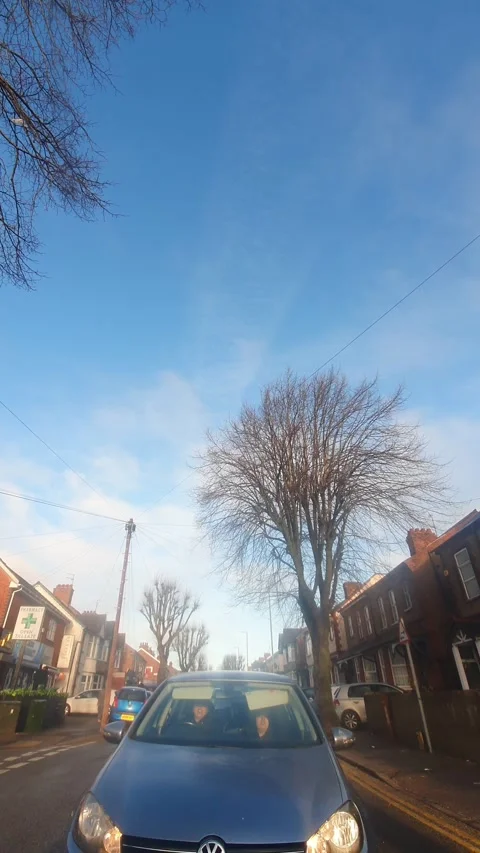 Wide Angle Vertical Footage of British Urban City Streets During Car Drive Stock Footage 327452199