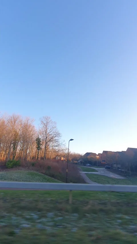 Wide Angle Vertical Footage of British Urban City Streets During Car Drive Vídeos de archivo 327452209