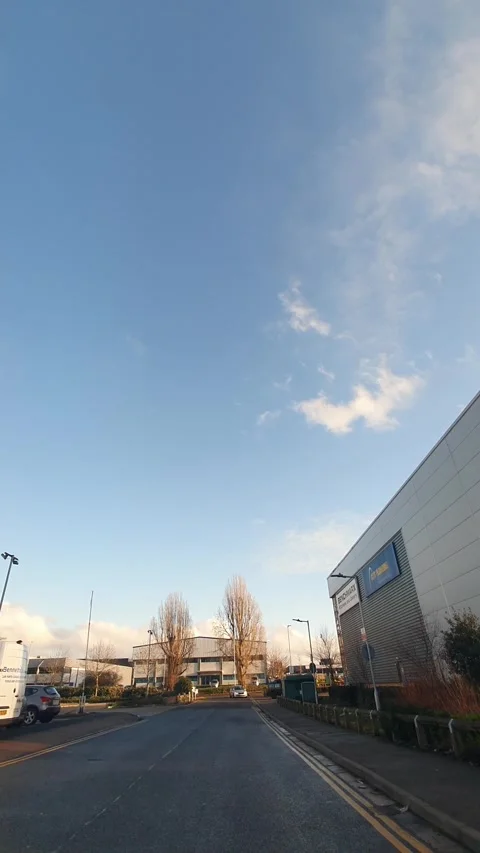 Wide Angle Vertical Footage of British Urban City Streets During Car Drive Stock Footage 327452332