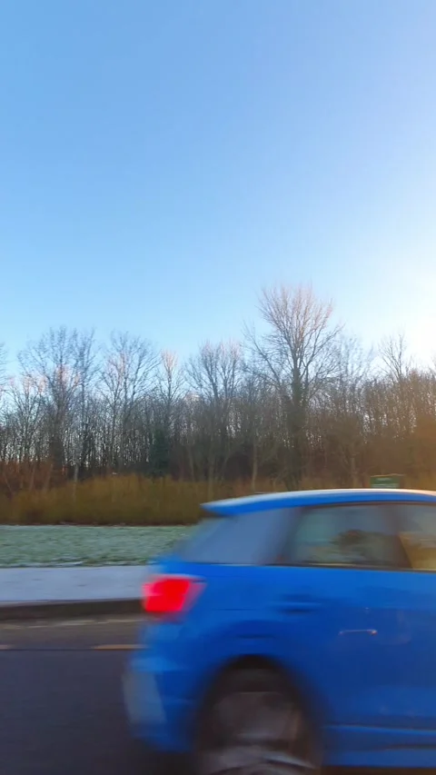 Wide Angle Vertical Footage of British Urban City Streets During Car Drive Vídeo Stock 327452454