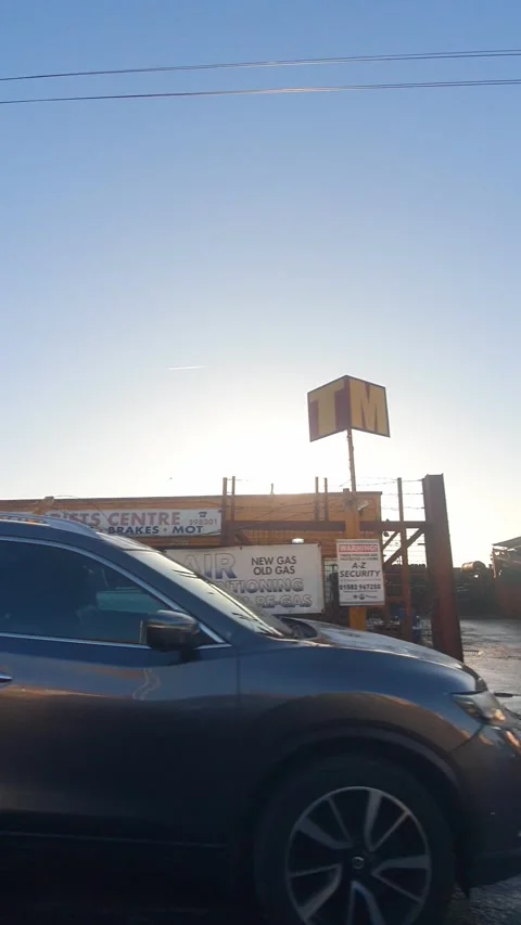 Wide Angle Vertical Footage of British Urban City Streets During Car Drive Stock Footage 327452587