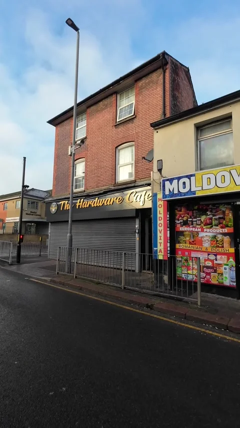 Wide Angle Vertical Footage of British Urban City Streets During Car Drive Stock Footage 327453168