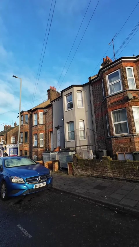 Wide Angle Vertical Footage of British Urban City Streets During Car Drive Vídeos de archivo 327453345