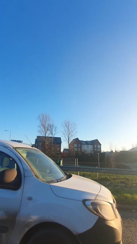 Wide Angle Vertical Footage of British Urban City Streets During Car Drive Stock Footage 327453922