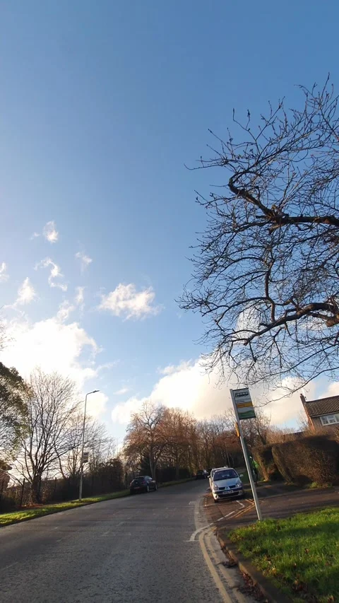 Wide Angle Vertical Footage of British Urban City Streets During Car Drive Vídeos de archivo 327454300