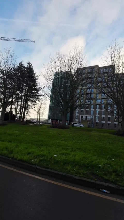 Wide Angle Vertical Footage of British Urban City Streets During Car Drive Stock Footage 327454921