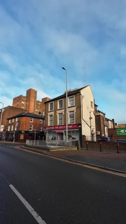Wide Angle Vertical Footage of British Urban City Streets During Car Drive Stock Footage 327455118