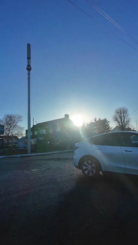 Wide Angle Vertical Footage of British Urban City Streets During Car Drive Stock Footage 327455339