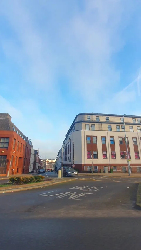 Wide Angle Vertical Footage of British Urban City Streets During Car Drive Vídeo Stock 327455519
