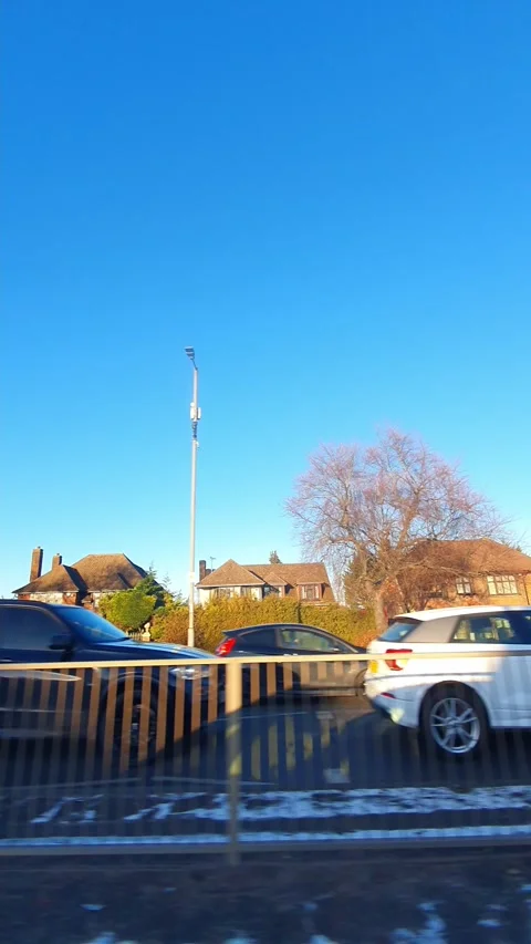 Wide Angle Vertical Footage of British Urban City Streets During Car Drive Vídeo Stock 327455941