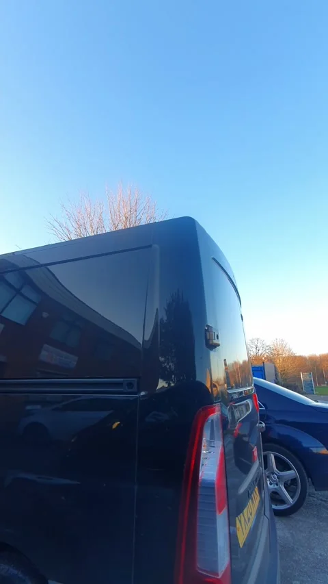 Wide Angle Vertical Footage of British Urban City Streets During Car Drive Stock Footage 327456730