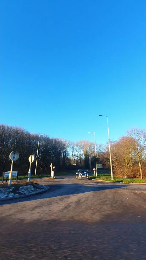 Wide Angle Vertical Footage of British Urban City Streets During Car Drive Vídeo Stock 327457231