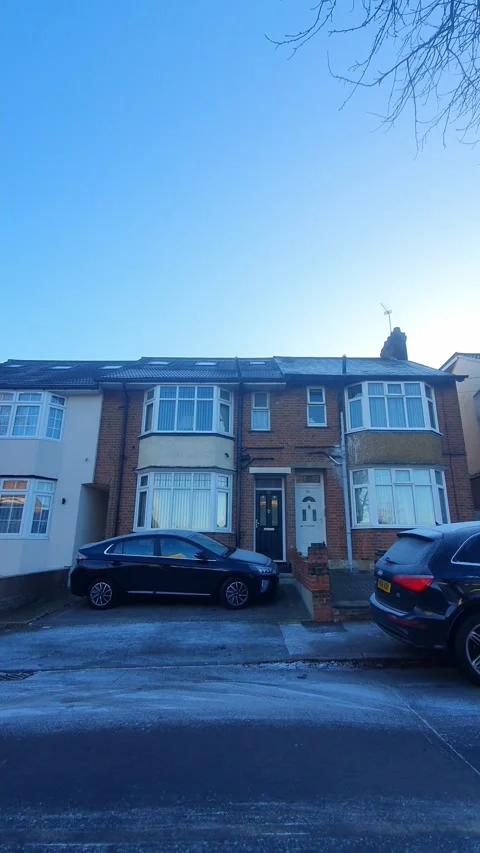 Wide Angle Vertical Footage of British Urban City Streets During Car Drive Stock Footage 327457232