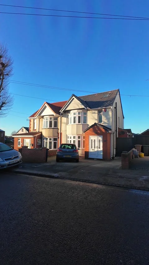 Wide Angle Vertical Footage of British Urban City Streets During Car Drive Vídeo Stock 327457935