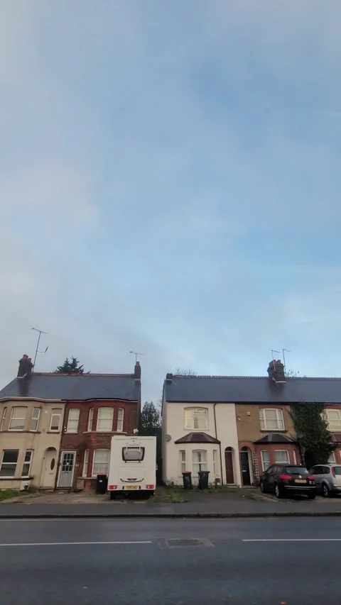 Wide Angle Vertical Footage of British Urban City Streets During Car Drive Stock Footage 327458402