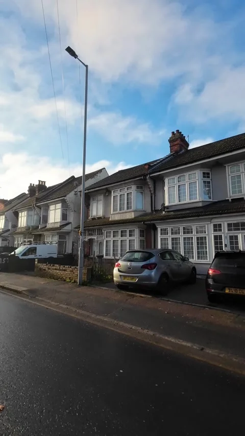 Wide Angle Vertical Footage of British Urban City Streets During Car Drive Stock Footage 327459291
