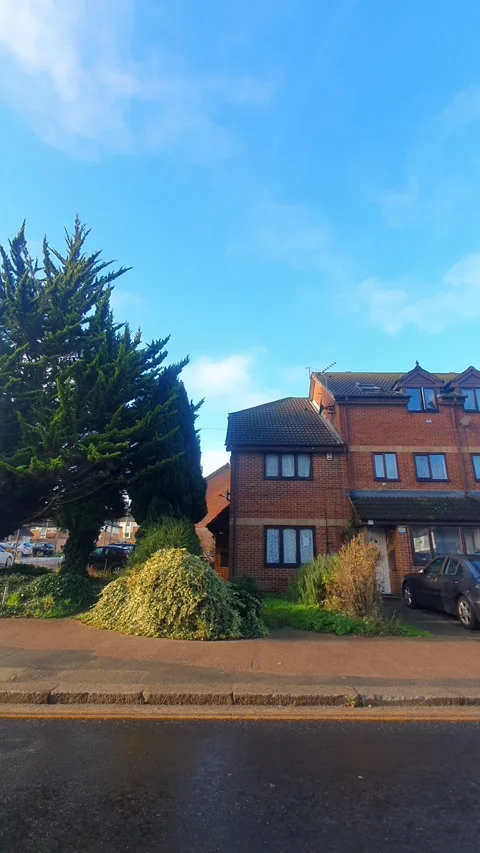 Wide Angle Vertical Footage of British Urban City Streets During Car Drive Stock Footage 327459499