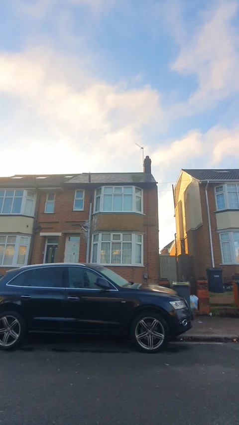 Wide Angle Vertical Footage of British Urban City Streets During Car Drive Stock Footage 327459512