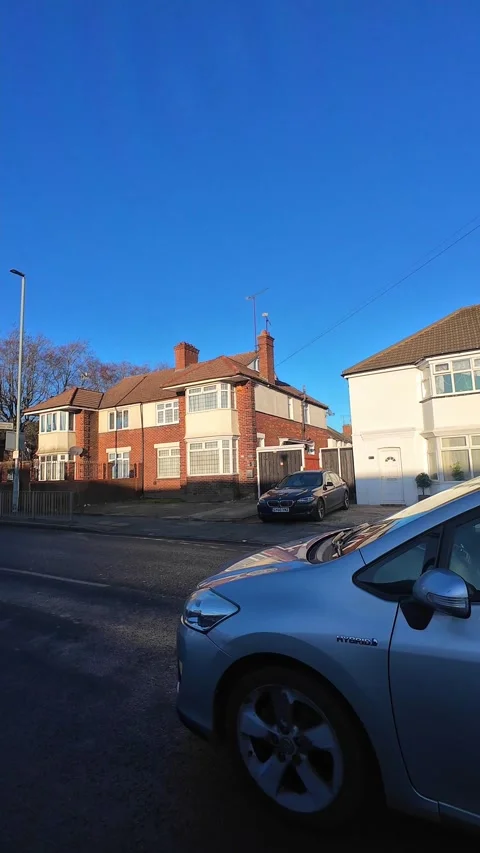 Wide Angle Vertical Footage of British Urban City Streets During Car Drive Vídeos de archivo 327459924