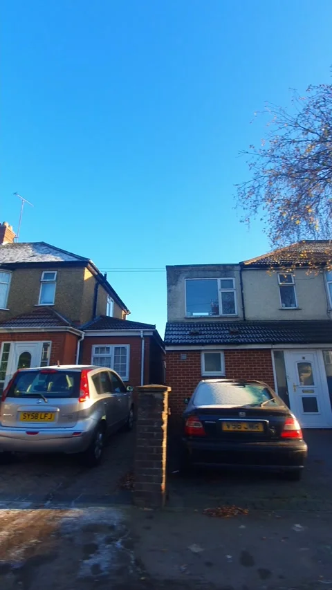 Wide Angle Vertical Footage of British Urban City Streets During Car Drive Vídeos de archivo 327462240